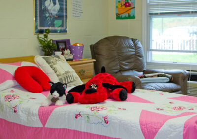 stuffed animals on bed