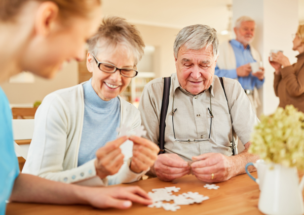 seniors working on a puzzle