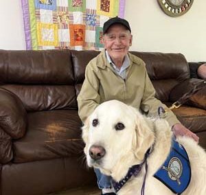 resident with a dog